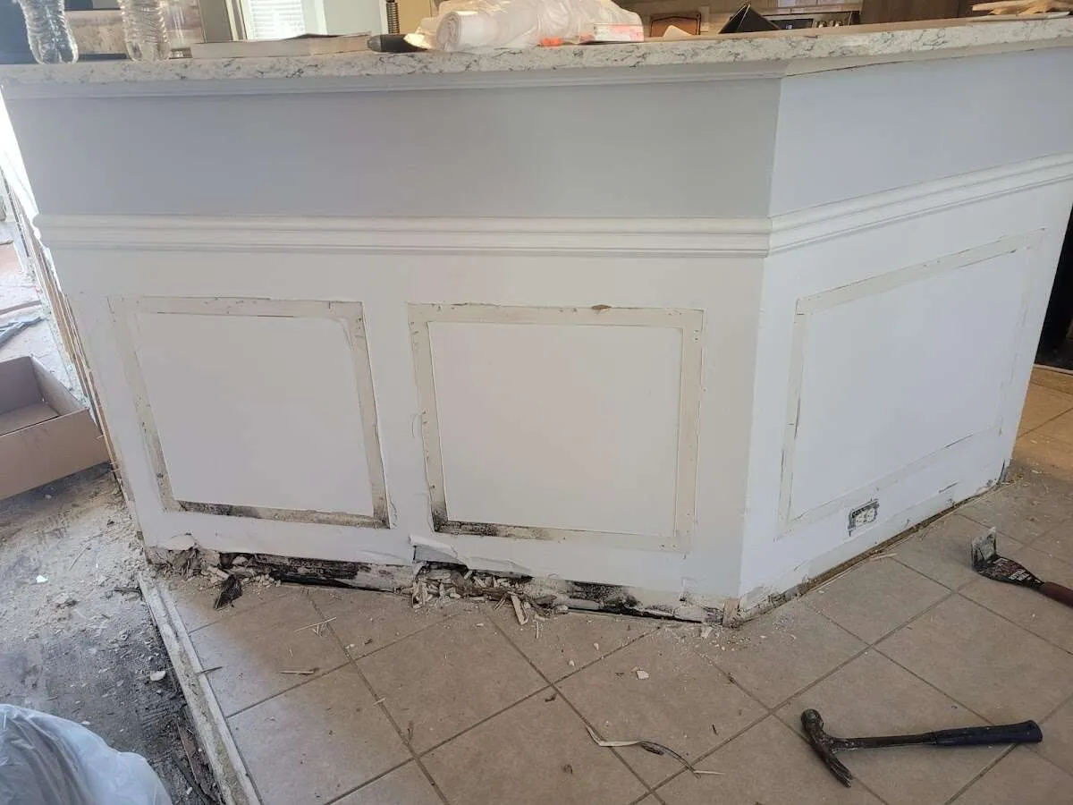 Water damage and mold on kitchen during Storm Damage Restoration in Lee's Summit